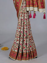 Cream semi pashmina silk saree with motfs weaving