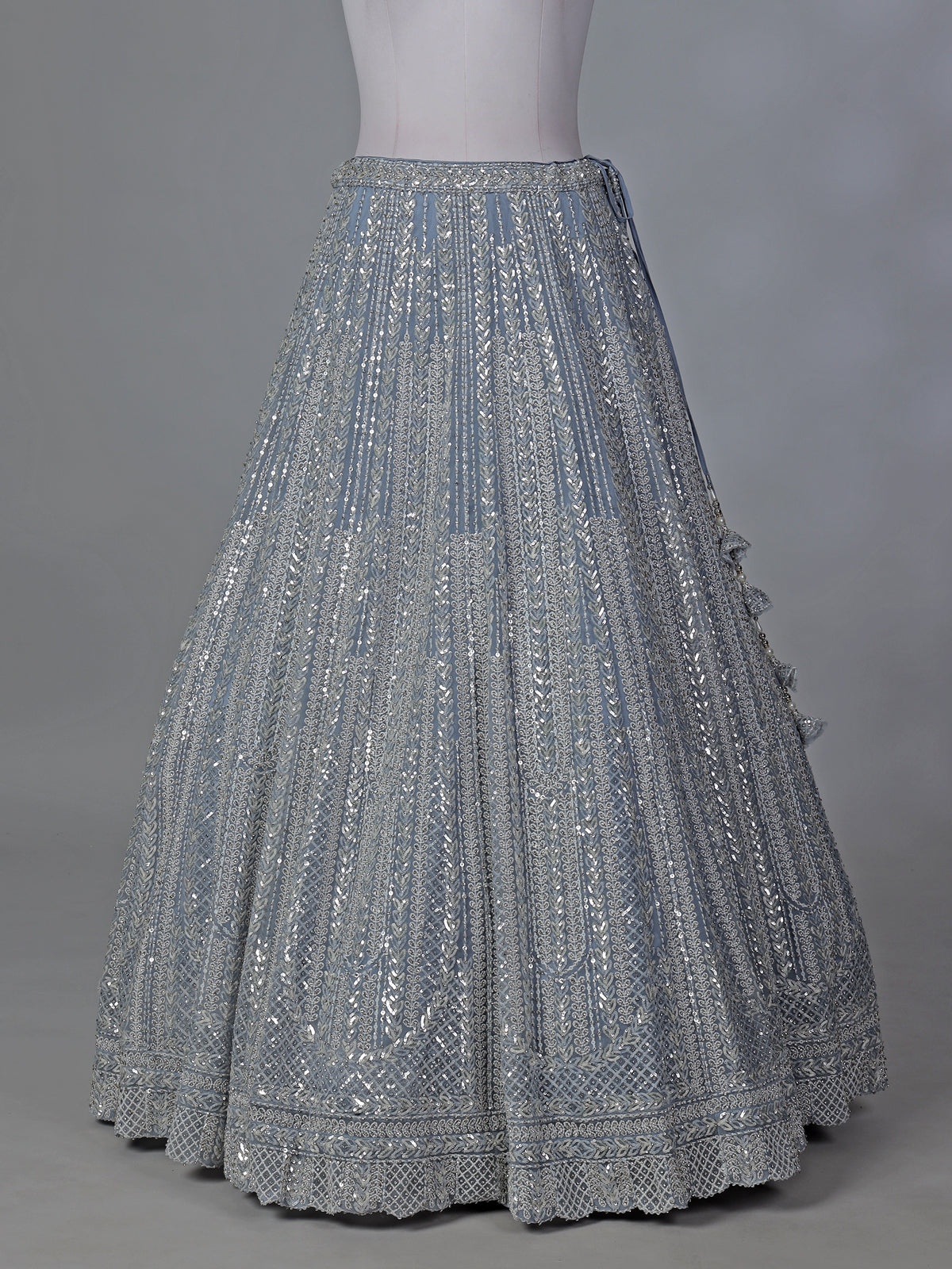 Grey wedding wear net lehenga choli with sequins detailing