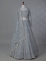 Grey wedding wear net lehenga choli with sequins detailing