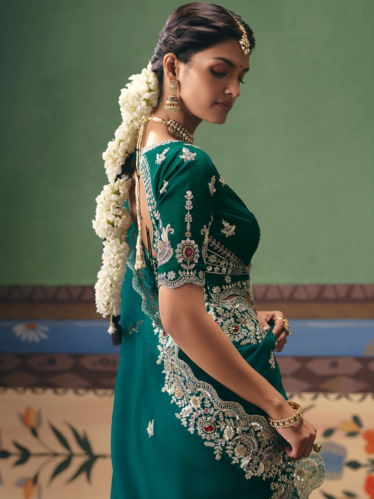 Rama green fancy silk saree for wedding celebrations