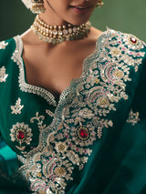 Rama green fancy silk saree for wedding celebrations