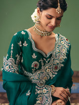 Rama green fancy silk saree for wedding celebrations