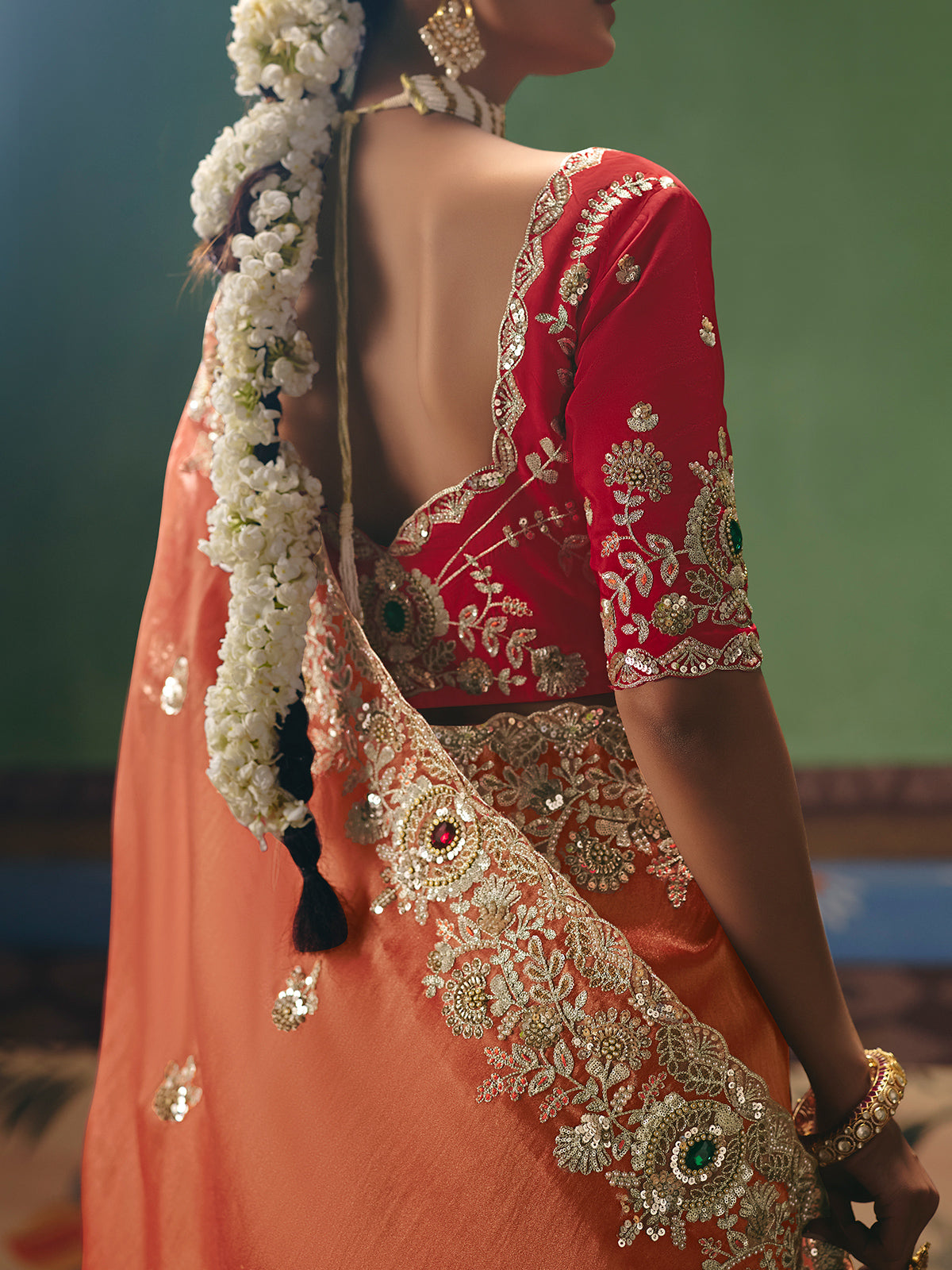 Peach fancy silk saree with rich embellishments