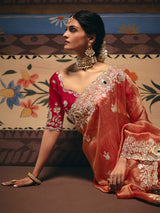 Peach fancy silk saree with rich embellishments