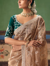 Beige fancy silk saree with rama green blouse