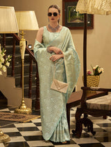 Pista green satin silk saree with zari detailing