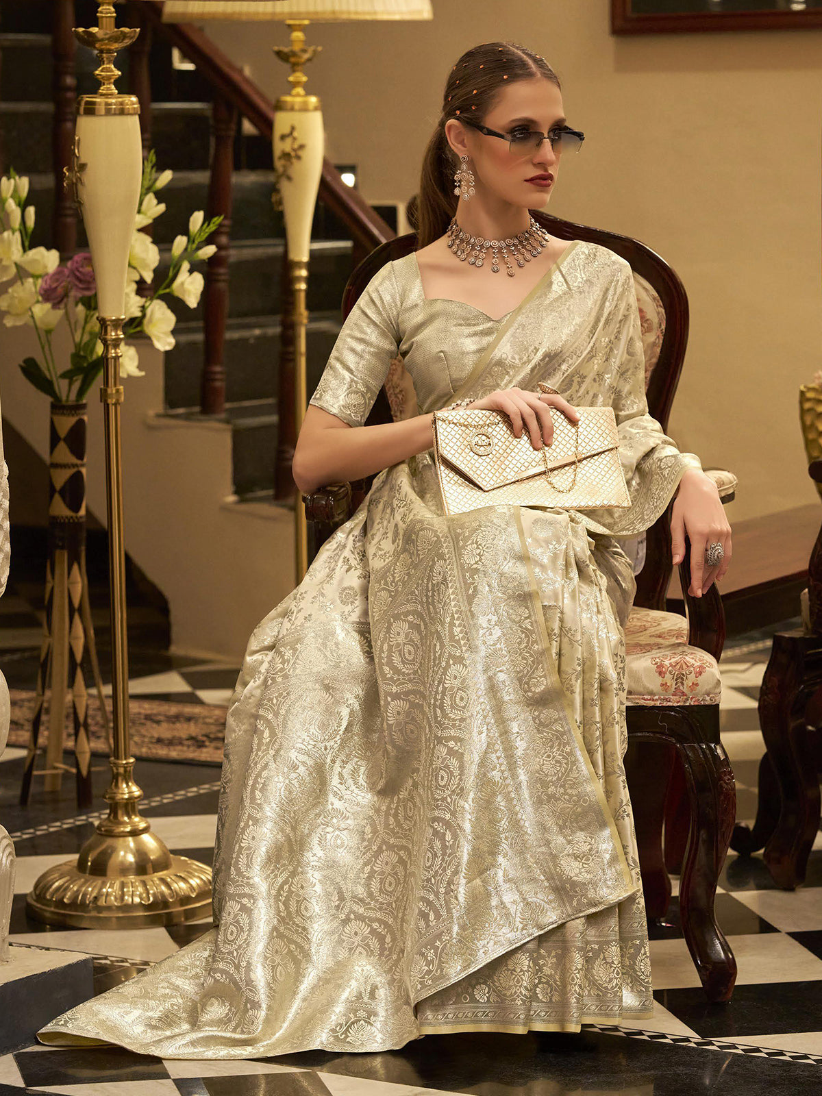 Cream satin silk saree with elegant zari work