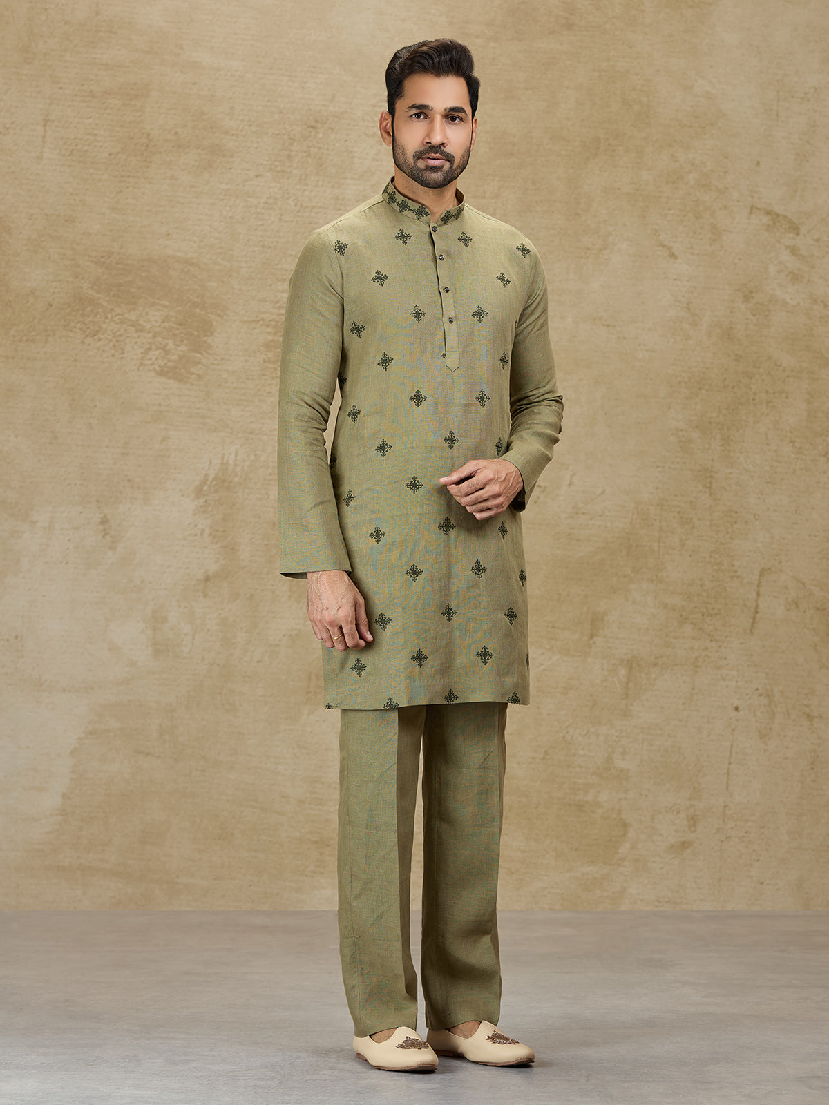 Olive green linen kurta suit for wedding celebrations