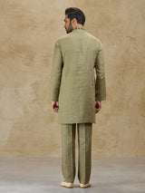 Olive green linen kurta suit for wedding celebrations