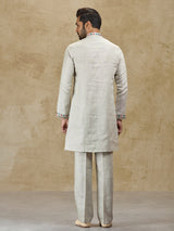 Beige linen kurta suit with colorful embroidery
