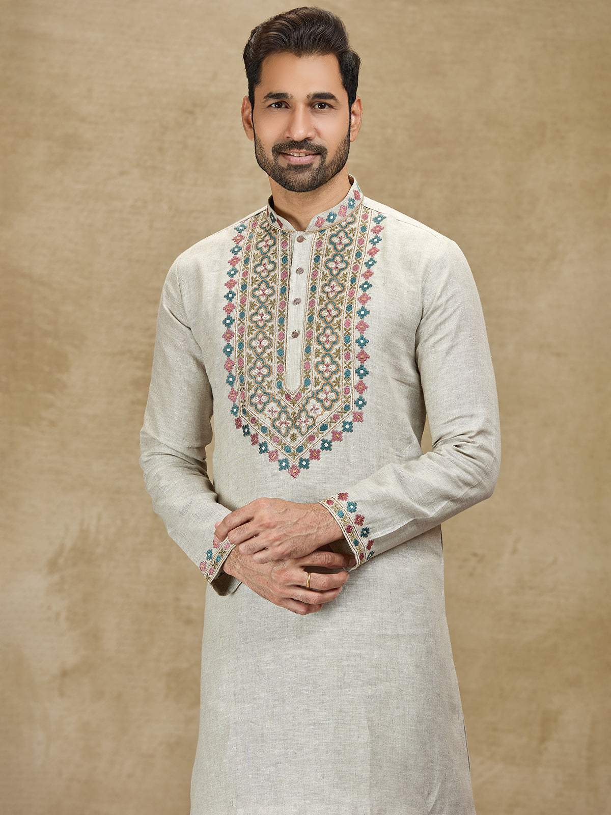 Beige linen kurta suit with colorful embroidery