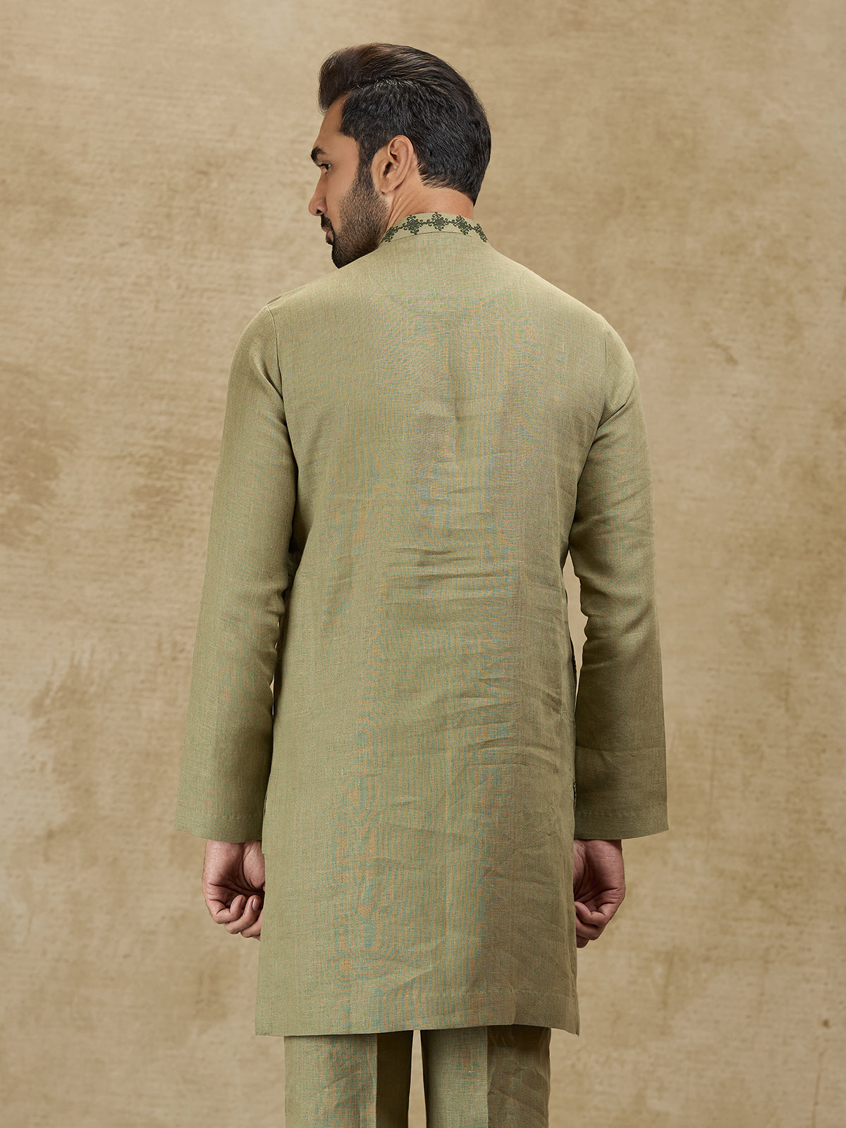 Olive green linen kurta for wedding celebrations