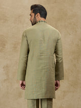 Olive green linen kurta for wedding celebrations