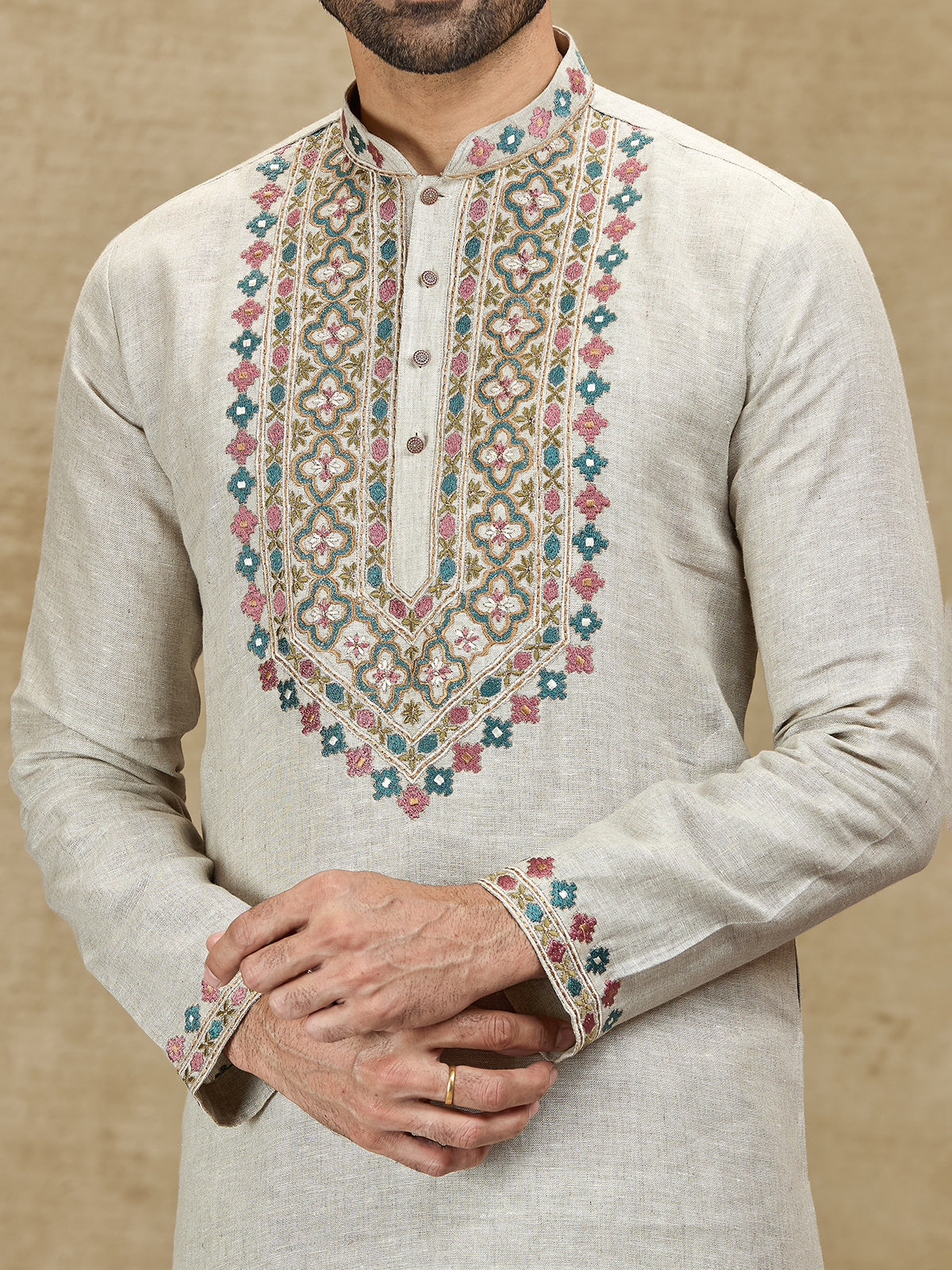 Beige linen kurta with colorful embroidery