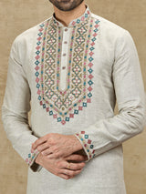 Beige linen kurta with colorful embroidery
