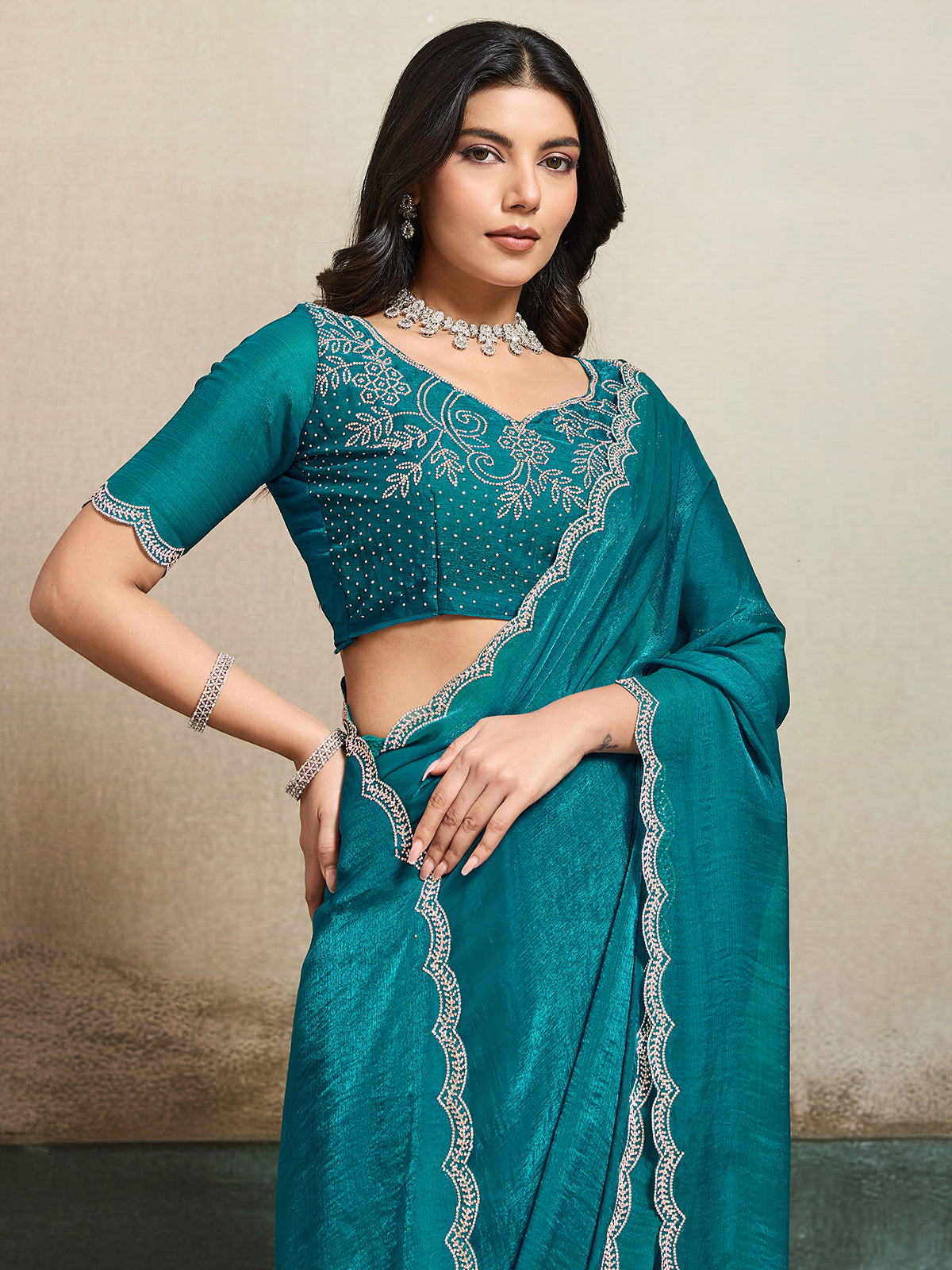 Rama green fandy chiffon saree with stones detailing