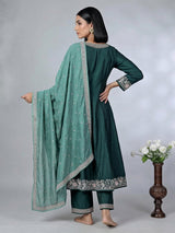 Green silk embroidered festive palazzo suit with contrast dupatta