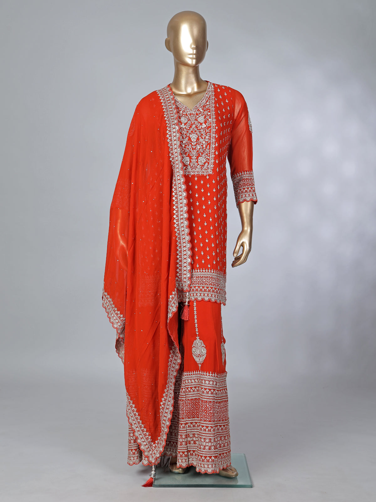 Orange georgette pakistani style embellished palazzo suit