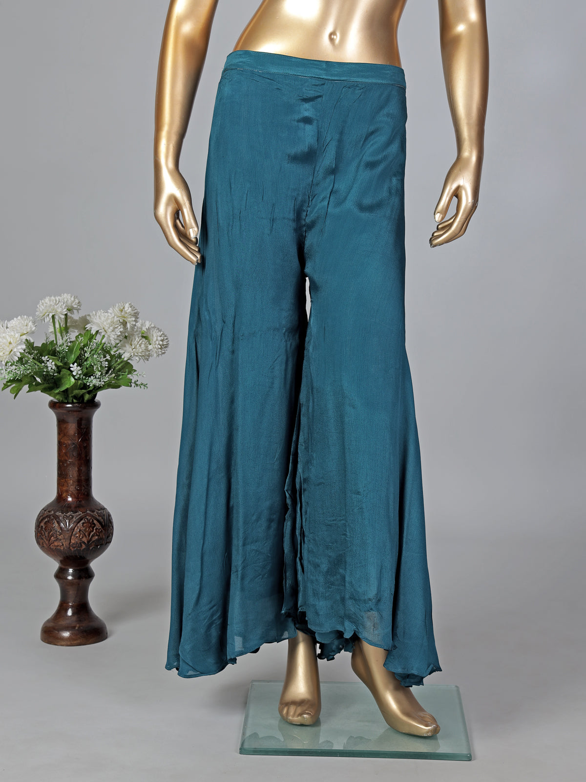 Peacock green silk zardosi embellished palazzo festive suit