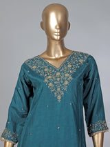 Peacock green silk zardosi embellished palazzo festive suit