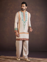 Beige printed wedding wear kurta suit with print