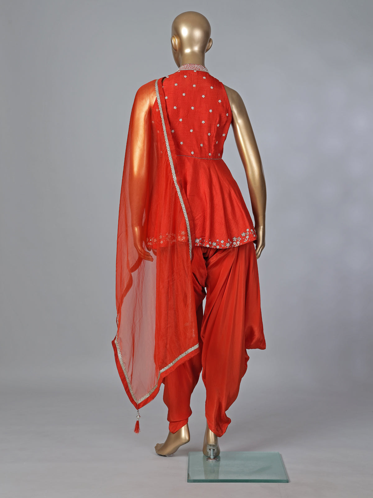 Rust orange designer silk dhoti suit with embellished dupatta