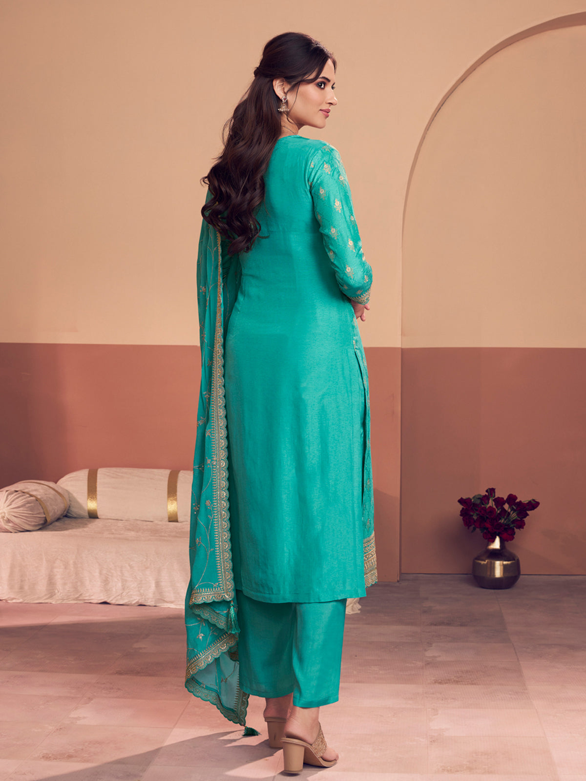 Aqua blue silk salwar suit with zari detailing