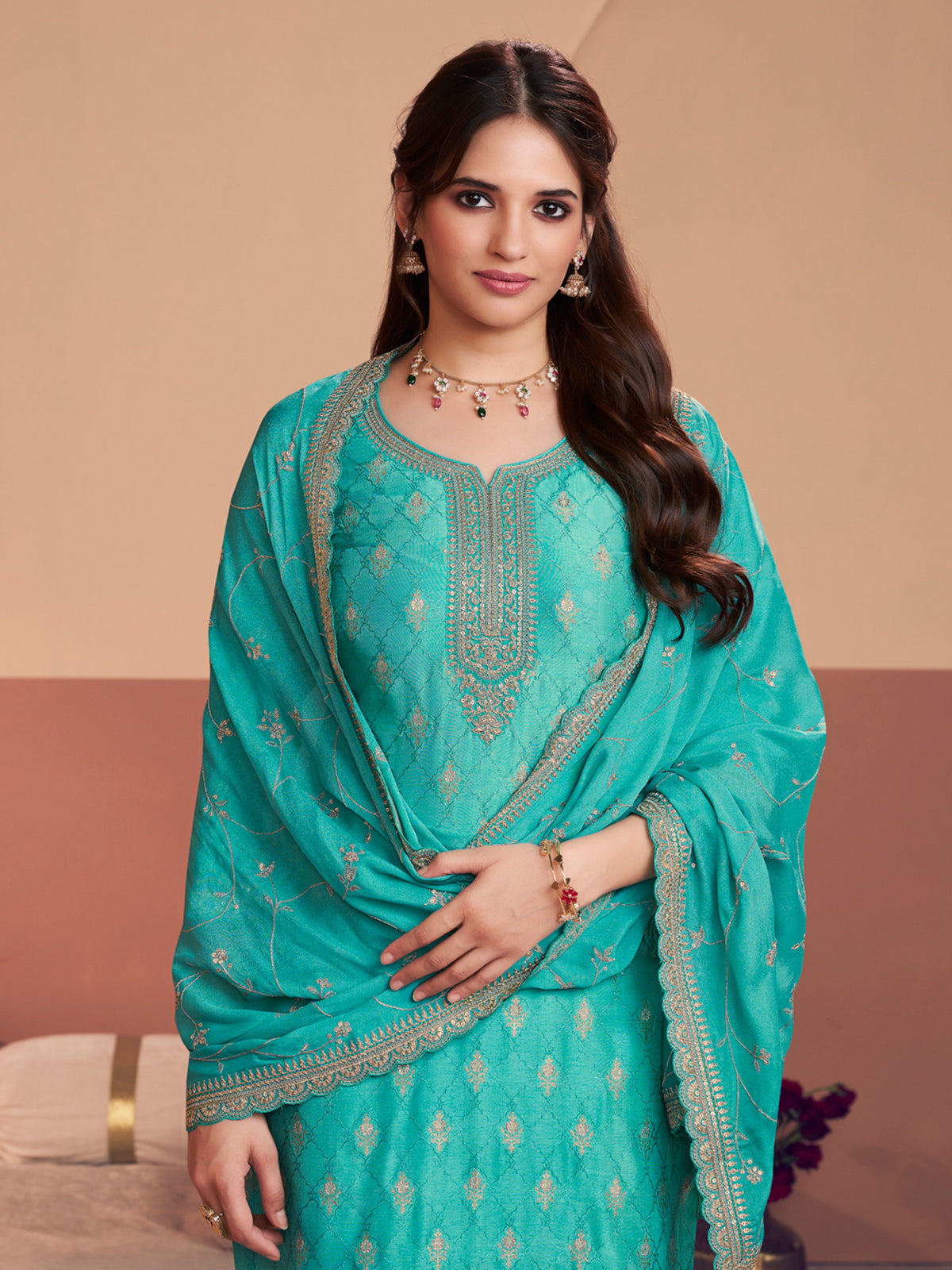 Aqua blue silk salwar suit with zari detailing