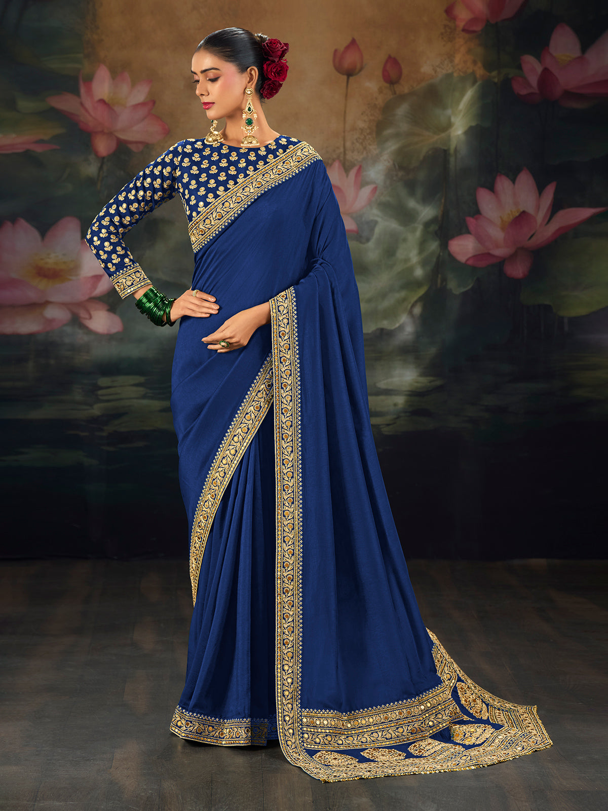 Blue munga silk plain saree with rich embellished border