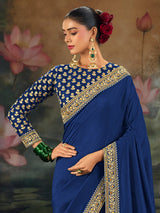 Blue munga silk plain saree with rich embellished border