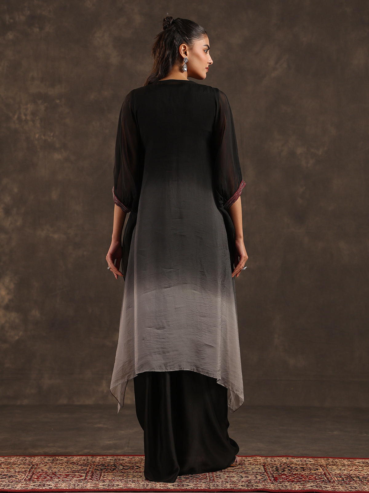 Black ombre organza kaftan suit with heavy festive embellishments