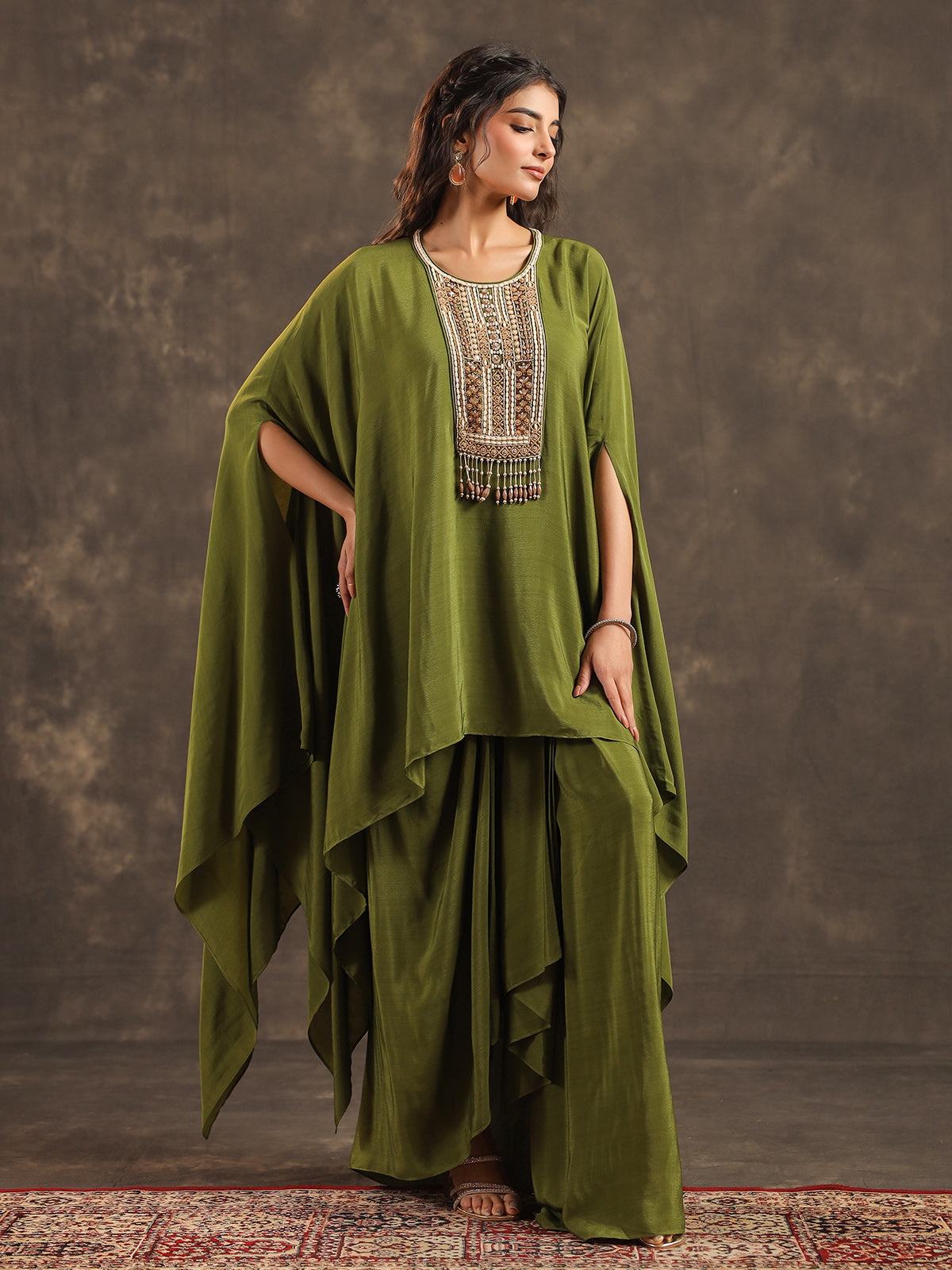 Mehendi green viscose crepe kaftan suit with festive embellishments