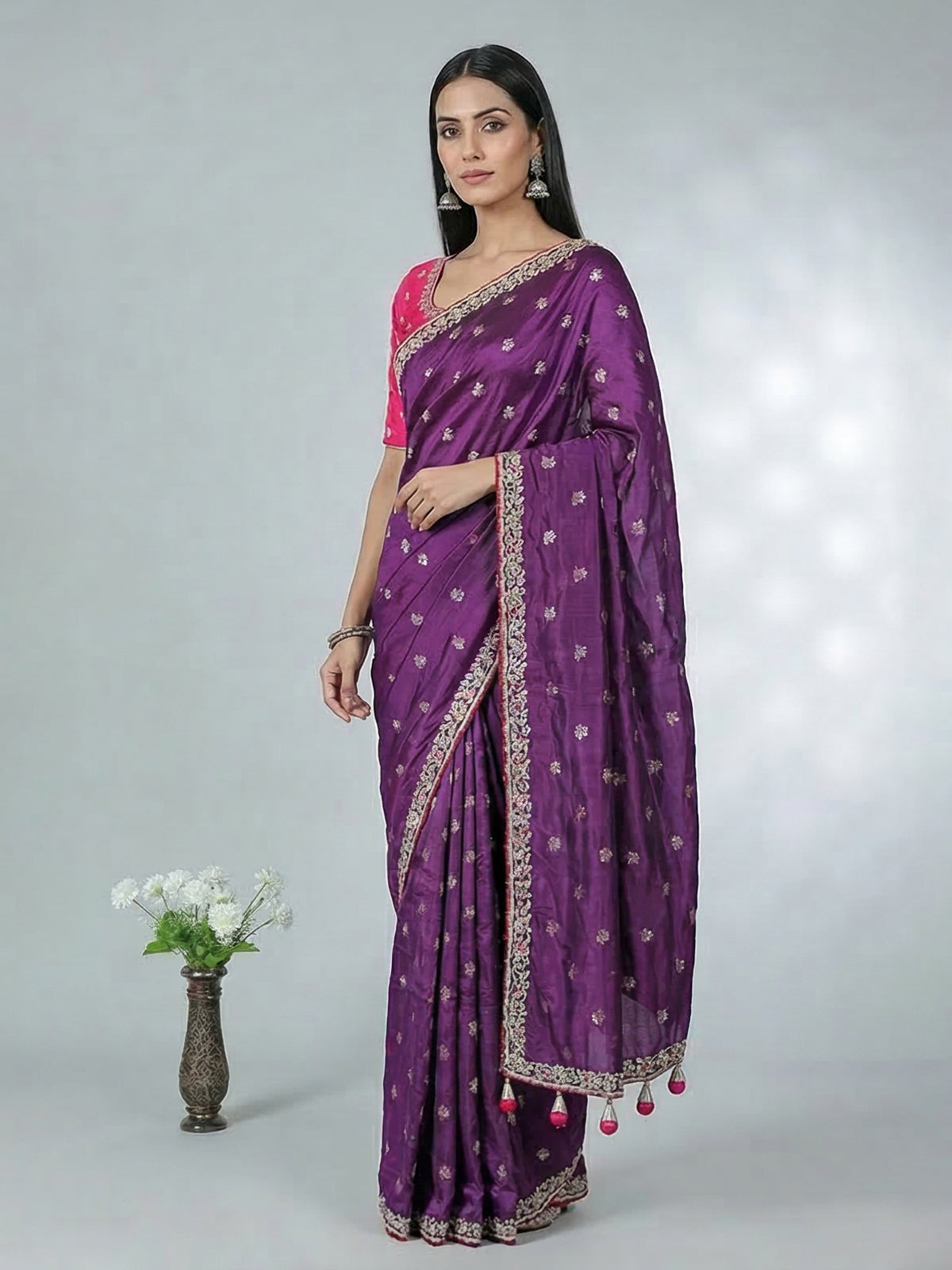 Purple dola silk saree with bold pink blouse