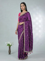 Purple dola silk saree with bold pink blouse