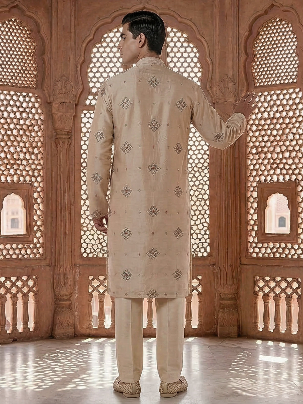 Cream silk embroidered kurta suit with festive sequin detailing
