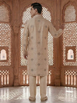 Cream silk embroidered kurta suit with festive sequin detailing