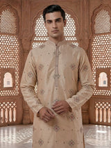Cream silk embroidered kurta suit with festive sequin detailing