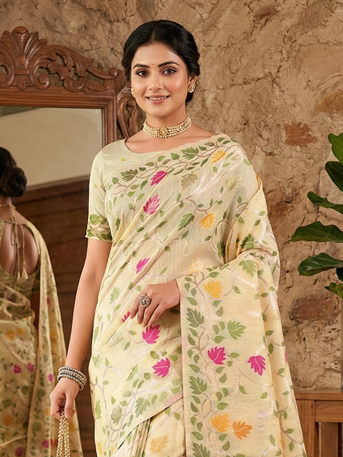 Cream linen cotton saree with colorful motifs