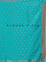 Aqua dola silk shimmering zardosi festive saree elegance