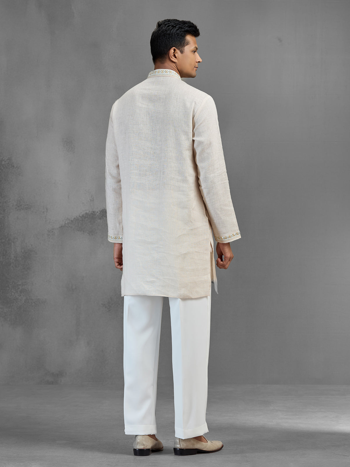 Cream linen subtle zari motif wedding kurta suit
