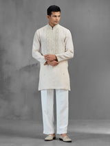 Cream linen subtle zari motif wedding kurta suit