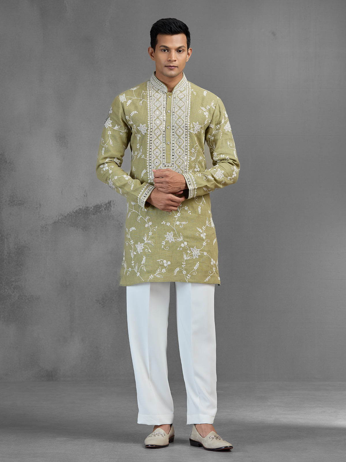 Green linen heritage aari crafted festive kurta suit
