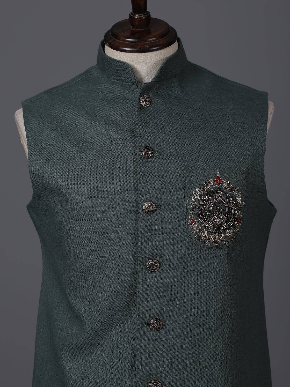Dark green linen heavily embellished waistcoat with brooch