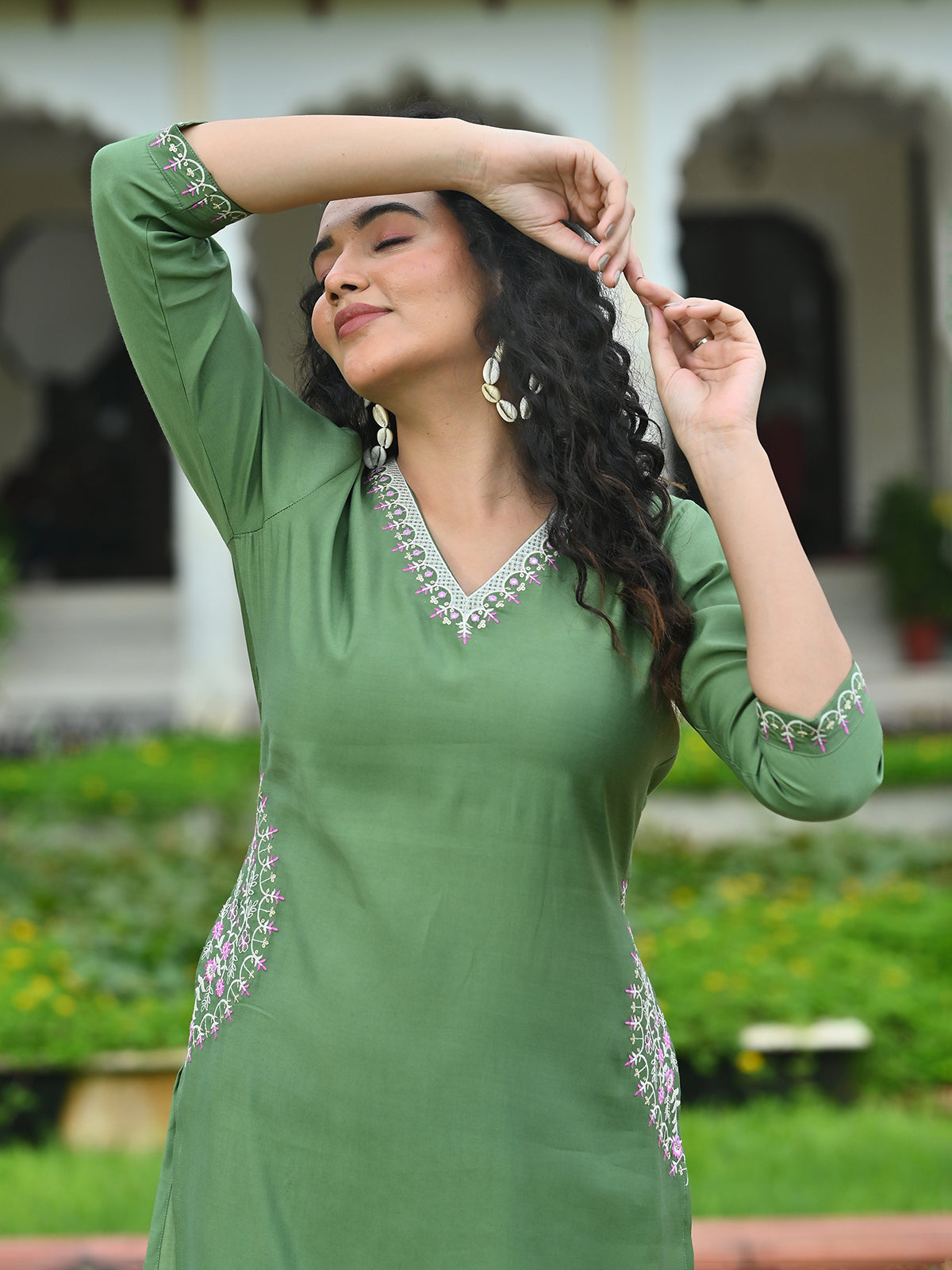 Pista green silk embroidered v neck casual kurti
