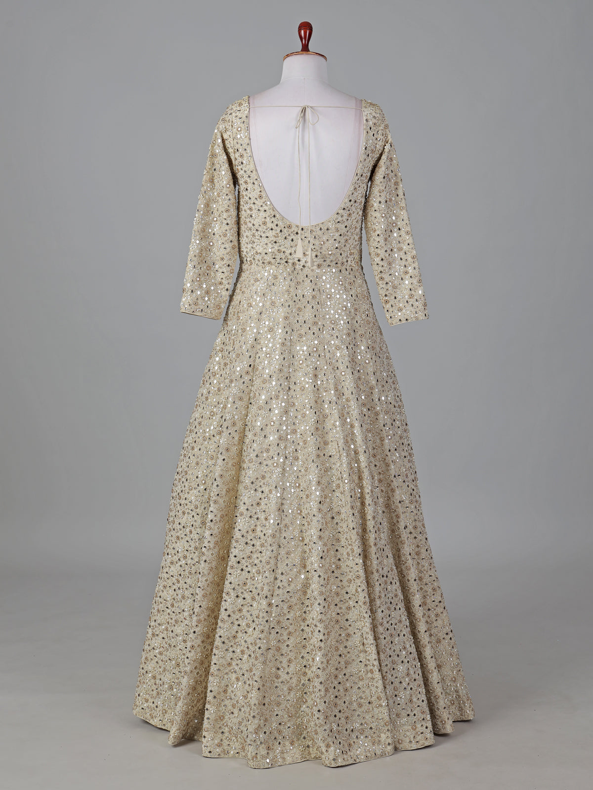 Cream silk anarkali suit with traditional festive charm