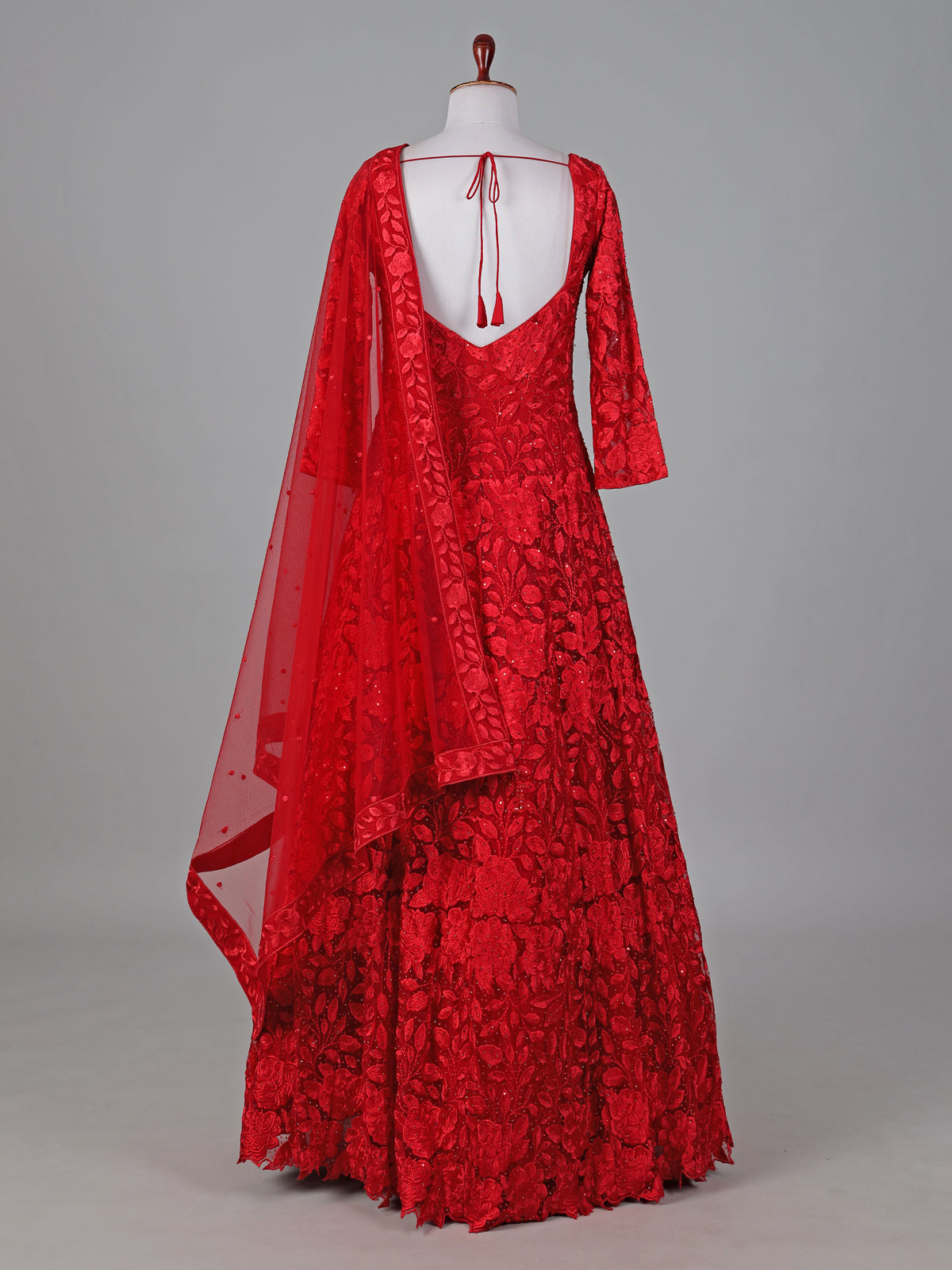 Red net anarkali suit with intricate zardosi elegance