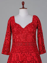 Red net anarkali suit with intricate zardosi elegance