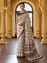 Off white printed muslin saree with unstitched blouse