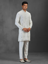 White silk wedding wear kurta suit with mirror work