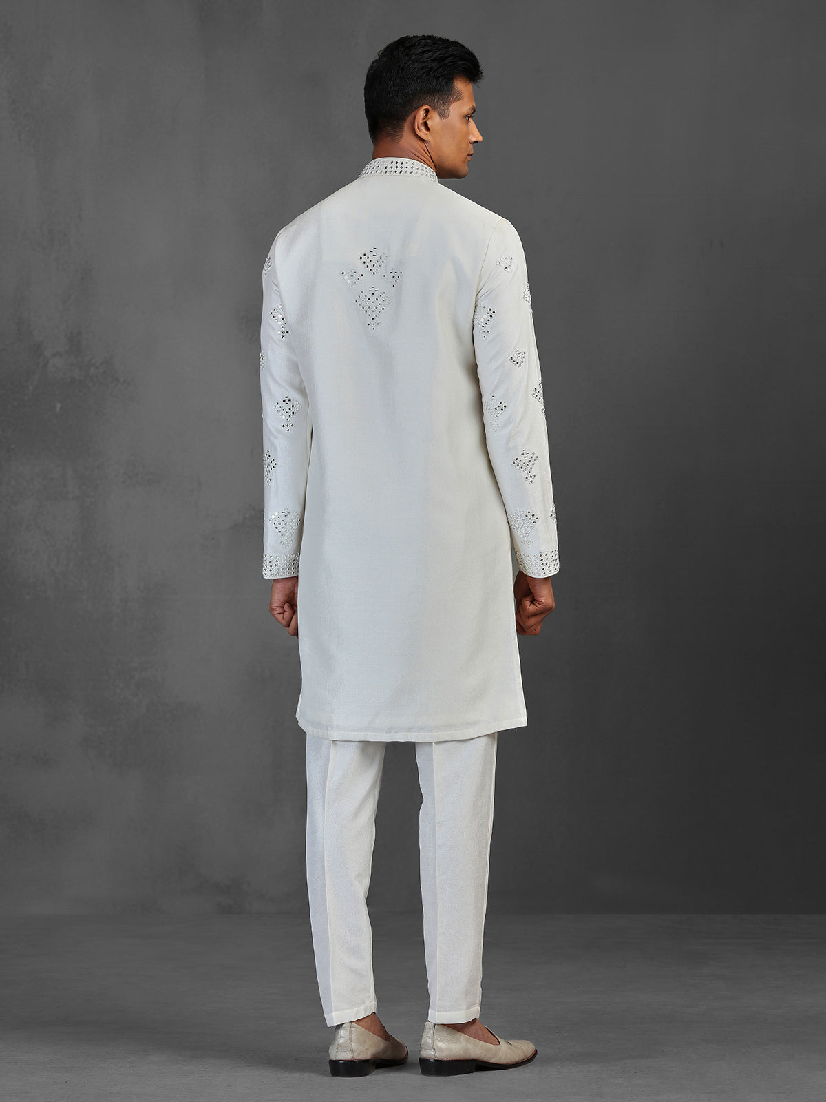White silk wedding wear kurta suit with mirror work